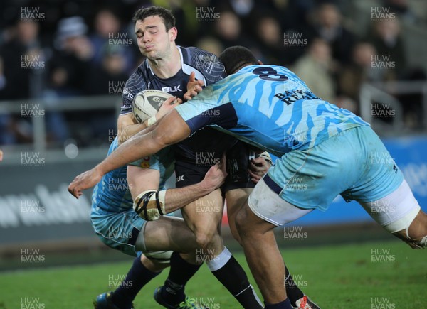 280315 - Ospreys v Zebre Rugby, Guinness PRO12 - Ospreys Tom Habberfield is tackled by Zebre's Samuela Vunisa and Zebre's Filippo Cristiano