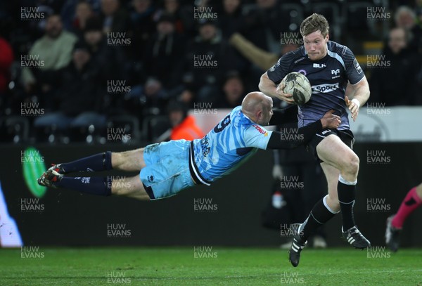 280315 - Ospreys v Zebre Rugby, Guinness PRO12 - Ospreys Jonathan Spratt is tackled by Zebre's Brendon Leonard