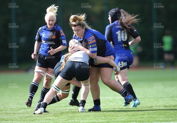 230918 - Ospreys Women v Dragons Women - Jodie Williams of Dragons is tackled