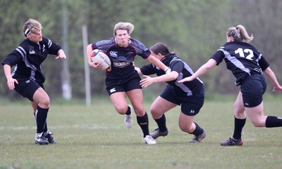 28.04.10 - Ospreys Women v Dragons Women -  Dragons Mared Evans looks to breakaway from the Ospreys defence 