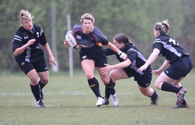 28.04.10 - Ospreys Women v Dragons Women -  Dragons Mared Evans looks to breakaway from the Ospreys defence 