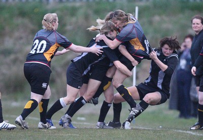 28.04.10 - Ospreys Women v Dragons Women -  Dragons Leila Johns is hauled into touch 