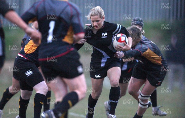 28.04.10 - Ospreys Women v Dragons Women -  Ospreys Kerin Lake tests the Dragons defence 