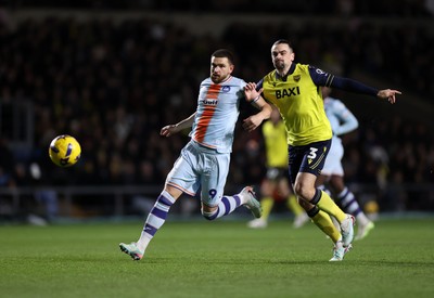 291225 - Oxford United v Swansea City - SkyBet Championship - Zan Vipotnik of Swansea City is challenged by Ciaron Brown of Oxford United 