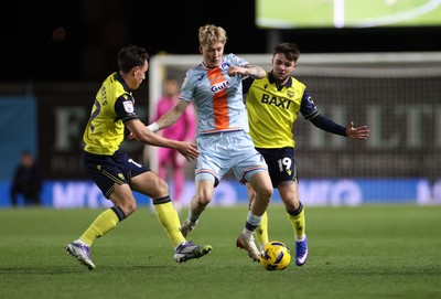 291225 - Oxford United v Swansea City - SkyBet Championship - Melker Widell of Swansea City is tackled by Tyler Goodrham of Oxford United 