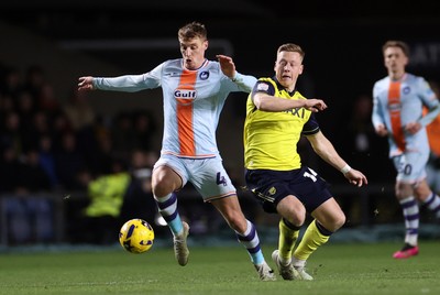 291225 - Oxford United v Swansea City - SkyBet Championship - Jay Fulton of Swansea City is tackled by Brian De Keersmaecker of Oxford United 