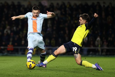 291225 - Oxford United v Swansea City - SkyBet Championship - Zan Vipotnik of Swansea City is tackled by Tyler Goodrham of Oxford United 