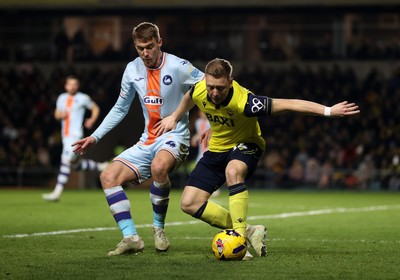 291225 - Oxford United v Swansea City - SkyBet Championship - Brian De Keersmaecker of Oxford United is tackled by Jay Fulton of Swansea City 