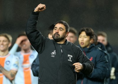 291225 - Oxford United v Swansea City - SkyBet Championship - Swansea City Manager Vitor Matos celebrates with fans at full time