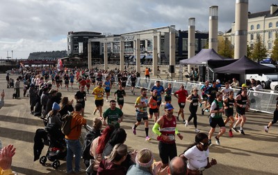 051025 - Oysho Cardiff Half Marathon - Runners make their way through Cardiff Bay as they take part in the Oysho Cardiff Half Marathon