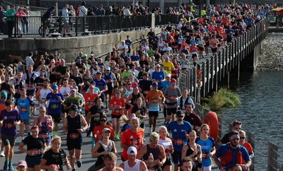 051025 - Oysho Cardiff Half Marathon - Runners make their way through Cardiff Bay as they take part in the Oysho Cardiff Half Marathon