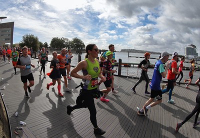 051025 - Oysho Cardiff Half Marathon - Runners make their way through Cardiff Bay as they take part in the Oysho Cardiff Half Marathon