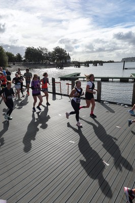 051025 - Oysho Cardiff Half Marathon - Runners make their way through Cardiff Bay as they take part in the Oysho Cardiff Half Marathon