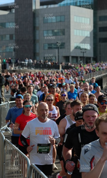 051025 - Oysho Cardiff Half Marathon - Runners make their way through Cardiff Bay as they take part in the Oysho Cardiff Half Marathon