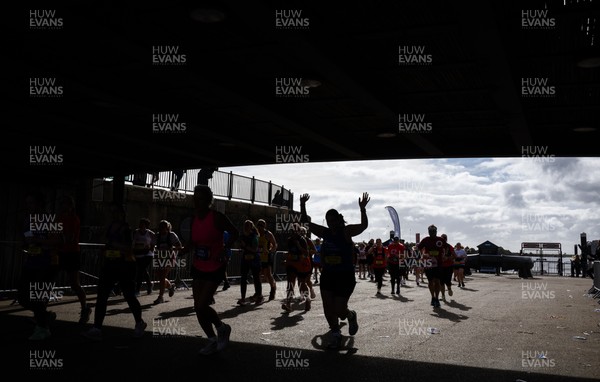 051025 - Oysho Cardiff Half Marathon - Runners make their way through Cardiff Bay as they take part in the Oysho Cardiff Half Marathon