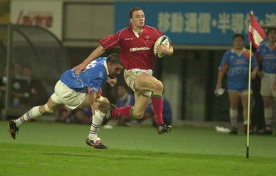 130601 - Pacific Barbarians v Wales -Mark Jones gets away from Adam Parker