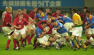 130601 - Pacific Barbarians v Wales -Greg Smith is tackled by Ben Evans
