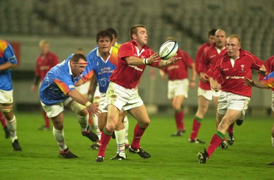 130601 - Pacific Barbarians v Wales -Lee Jarvis passes as Matt Sexton comes in to tackle