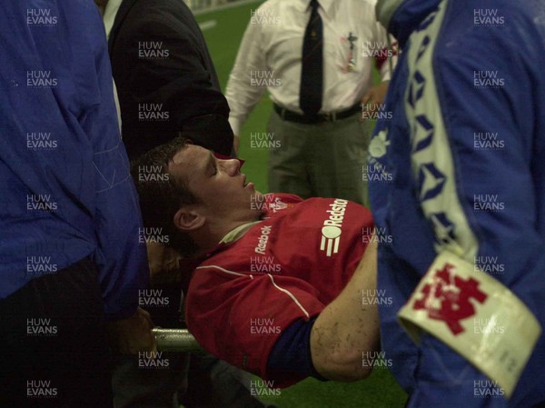 130601 - Pacific Barbarians v Wales -Mark Jones is stretchered from the field after injuring his knee