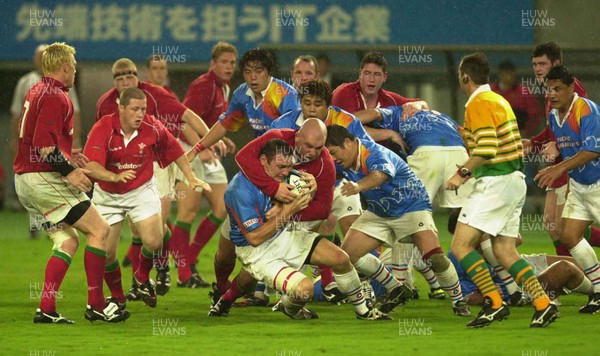 130601 - Pacific Barbarians v Wales -Greg Smith is tackled by Ben Evans
