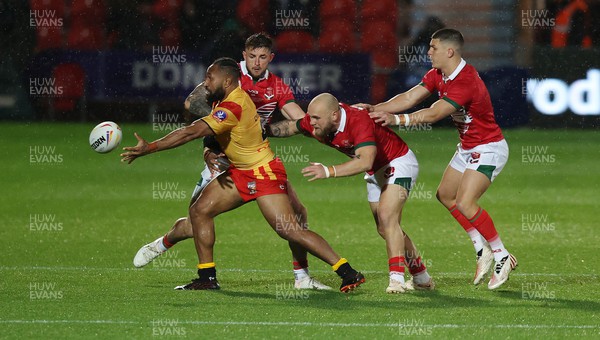 311022 - Papua New Guinea v Wales - Rugby League World Cup 2021 - Justin Olam of PNG loses the ball after Wales tackle