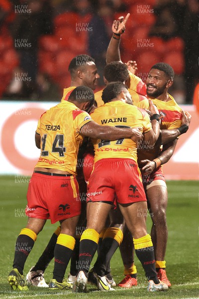 311022 - Papua New Guinea v Wales - Rugby League World Cup 2021 - PNG celebrate on the last try of the match