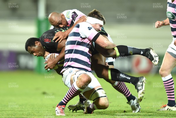 140117 - Pau v Cardiff Blues - European Rugby Challenge Cup - Watisoni Votu of Pau is tackled by Taufa'ao Filise and James Down of Cardiff Blues by Ben Evans/Huw Evans Agency