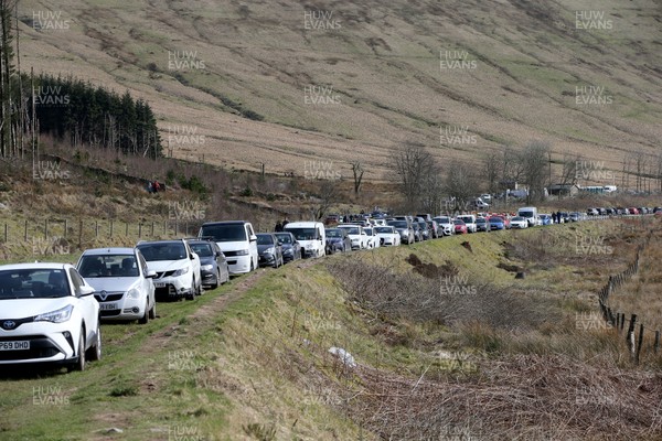 210320 - Coronavirus outbreak -  Large numbers of parked cars on the A470 leading to the walk up to Pen y Fan, the highest peak in southern Britain 