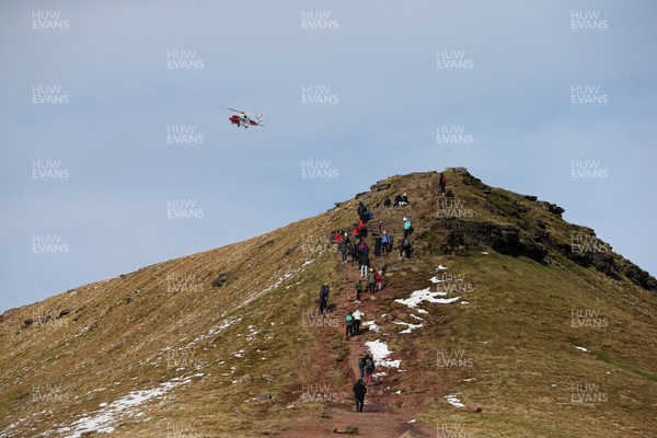 210320 - Coronavirus outbreak -  Walkers at the summit of Corn Du, the second highest peak in South Wales 