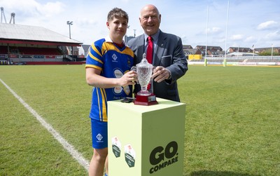 020526 - Penallta v Talywain, U18s Boys Club Bowl Final - Penallta captain Kian Young receives the  U18s Boys Club Bowl Final trophy  from WRU President Terry Cobner