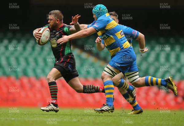 160417 - Penallta v Ystalyfera, WRU National Plate Final - Matthew Scott of Ystalyfera is tackled by Rhys Stephens of Penallta