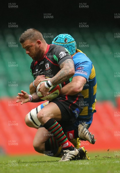 160417 - Penallta v Ystalyfera, WRU National Plate Final - Matthew Scott of Ystalyfera is tackled by Rhys Stephens of Penallta