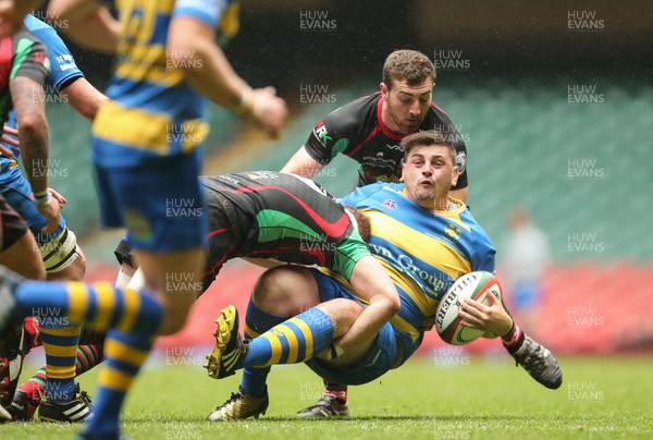 160417 - Penallta v Ystalyfera, WRU National Plate Final - Jonny Wright of Penallta is tackled