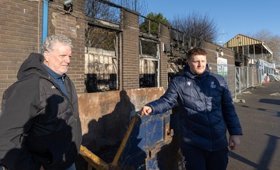 031225 - Penarth RFC Clubhouse Fire - Dan Mears, Penarth RFC Secretary with Cardiff Rugby and Welsh international Evan Lloyd at the Penarth RFC Clubhouse which was devastated by a recent fire