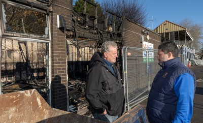 031225 - Penarth RFC Clubhouse Fire -  Alan Cozens Penarth RFC Commercial secretary, left and Dan Mears, Penarth RFC Secretary at the Penarth RFC Clubhouse which was devastated by a recent fire