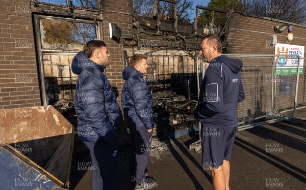 031225 - Penarth RFC Clubhouse Fire - Cardiff Rugby and Welsh internationals Mason Grady and Evan Lloyd and Cardiff Rugby Club head coach Corniel van Zyl at the Penarth RFC Clubhouse which was devastated by a recent fire