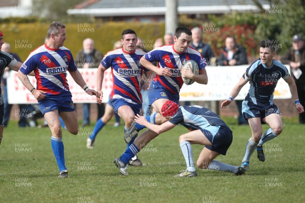 200413 Pencoed v Trebanos…Pencoed's Glen Hiscocks is tackled by Rhos Jones