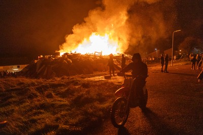 051125 - Picture shows a huge community bonfire and Fireworks display in Penrhys, Rhondda Cynon Taff in the South Wales valleys this evening on Guy Fawkes Night