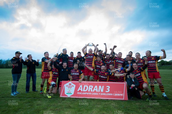 250419 - Penygroes v Cwmgwrach, WRU League 3 West Central C - Penygroes celebrate after being presented with the League 3 West Central C title trophy