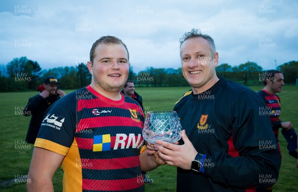 250419 - Penygroes v Cwmgwrach, WRU League 3 West Central C - Penygroes captain Josh Powell and head coach Andrew Richards with the League 3 West Central C title trophy 