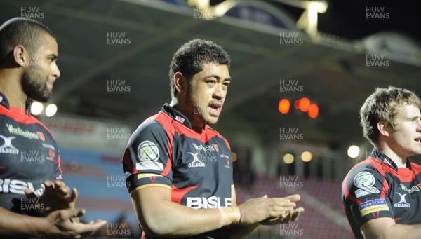 14.01.12 - Perpignan v Dragons - Amiln Challenge Cup Aled Brew, Toby Faletau and Jonathan Evans of Dragons look dejected at the end of the game. 