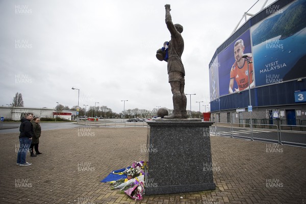 190320 - Picture shows fans laying floral tributes to footballer Peter Whittingham, who has died aged 35 at Cardiff City Stadium this afternoon