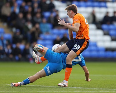 011125 - Peterborough United v Cardiff City - FA Cup First Round - Dylan Lawlor of Cardiff and Harry Leonard of Peterborough
