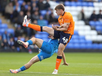 011125 - Peterborough United v Cardiff City - FA Cup First Round - Dylan Lawlor of Cardiff and Harry Leonard of Peterborough