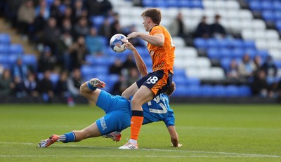 011125 - Peterborough United v Cardiff City - FA Cup First Round - Dylan Lawlor of Cardiff and Harry Leonard of Peterborough