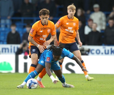 011125 - Peterborough United v Cardiff City - FA Cup First Round - Alex Robertson of Cardiff and Abraham Odoh of Peterborough 