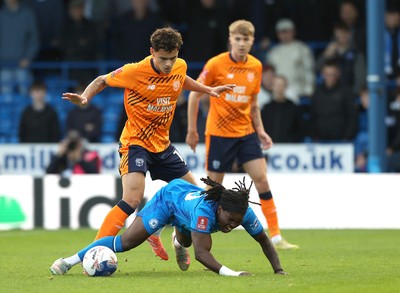 011125 - Peterborough United v Cardiff City - FA Cup First Round - Alex Robertson of Cardiff and Abraham Odoh of Peterborough 