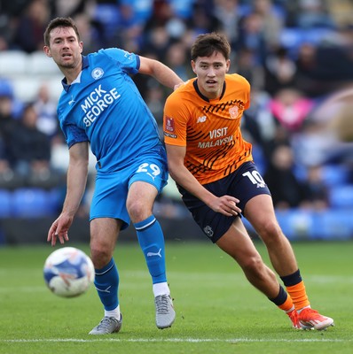 011125 - Peterborough United v Cardiff City - FA Cup First Round - Rubin Colwill of Cardiff and Tom O’Connor of Peterborough