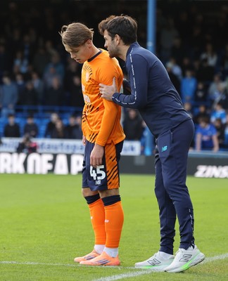 011125 - Peterborough United v Cardiff City - FA Cup First Round - Manager Brian Barry-Murphy of Cardiff has a word with Cian Ashford of Cardiff during a lull in the match