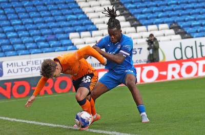 011125 - Peterborough United v Cardiff City - FA Cup First Round - Cian Ashford of Cardiff and Peter Kioso of Peterborough
